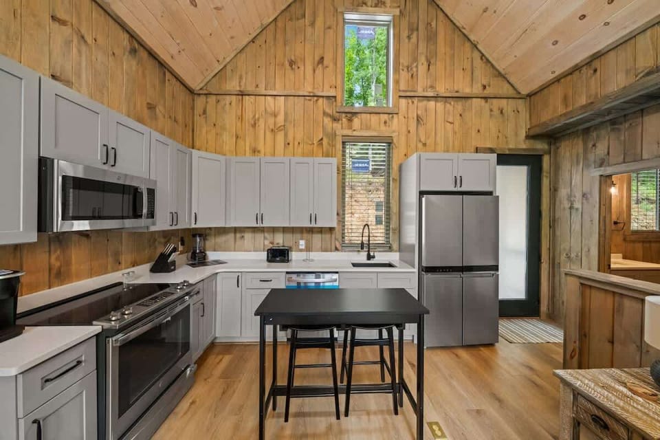 Fully stocked kitchen so you can cook and feed your group during your stay. (stove, oven, microwave, sink (no disposal), fridge, freezer, coffee machine, blender, can opener, toaster, cook/bakeware, silverware, dishes, cups, mugs, and wine glasses.