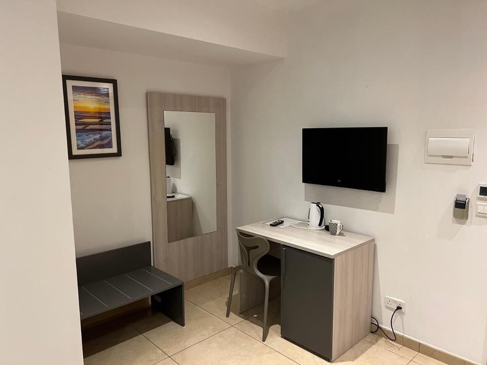 Quadruple Room | In-room safe, desk, laptop workspace, blackout drapes