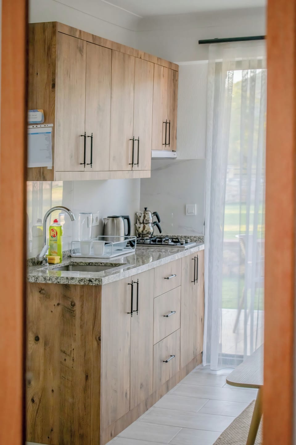 Apartment, Garden View | In-room safe, blackout drapes, iron/ironing board, free WiFi