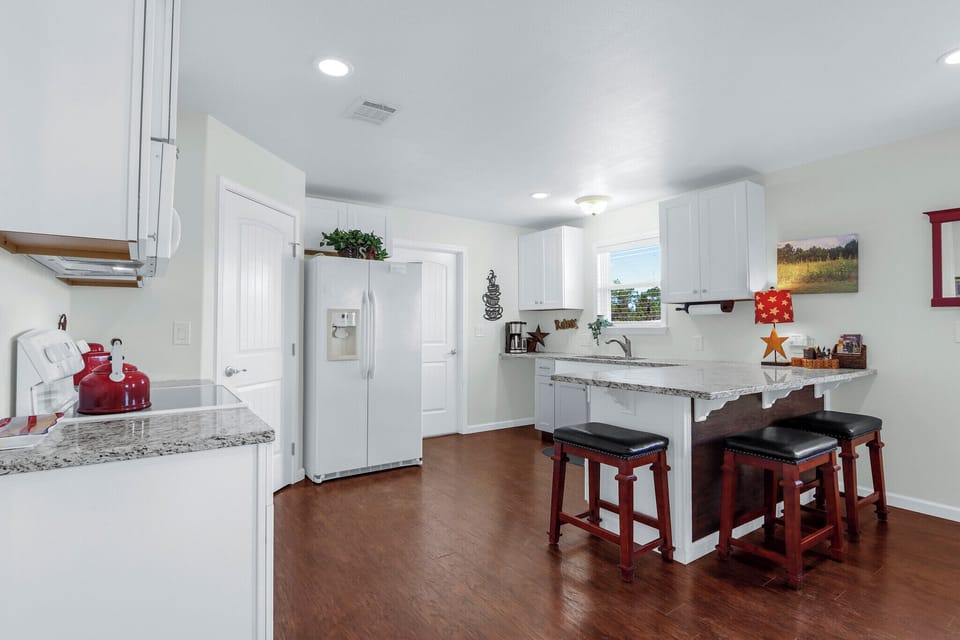 Spacious kitchen stocked with all appliances needed for cooking