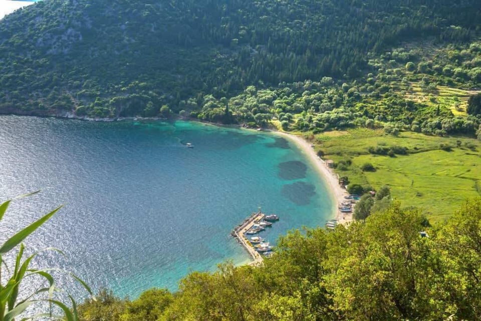 Poli (3km)-a sandy beach surrounded by lush greenery