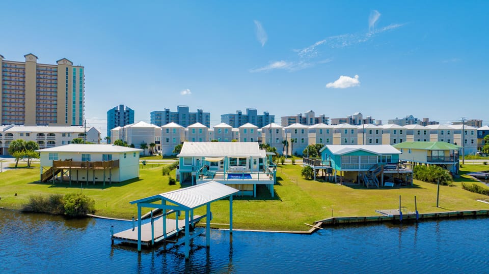 Offering a private pool, boat lift, pier and kayak launch