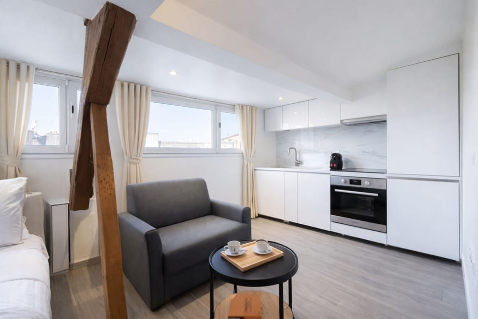 Superior Studio Suite, City View | Living area | 80-cm Smart TV with digital channels