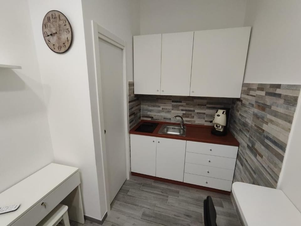 Mini-fridge, microwave, oven, stovetop