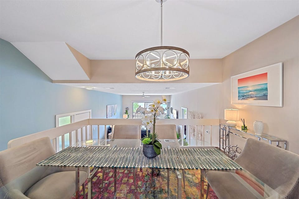 Gorgeous dining room overlooks the main living space