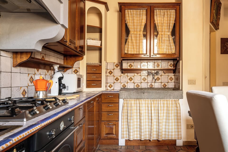 Apartment | Private kitchen | Fridge, oven, stovetop, espresso maker