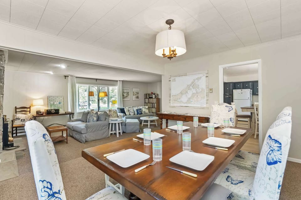 Dining room seats 6 with window-wrapped views