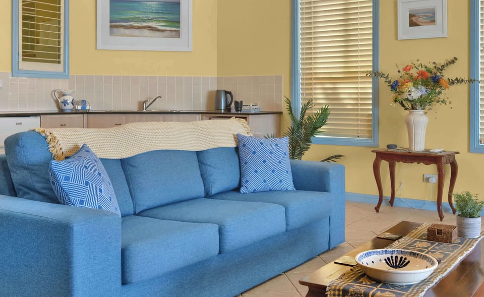 Coastal living area with compact kitchenette