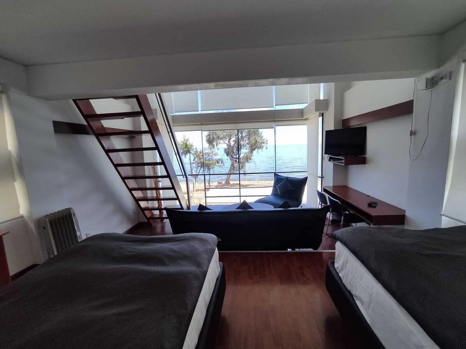 Family Room, Lake View | Desk, free WiFi