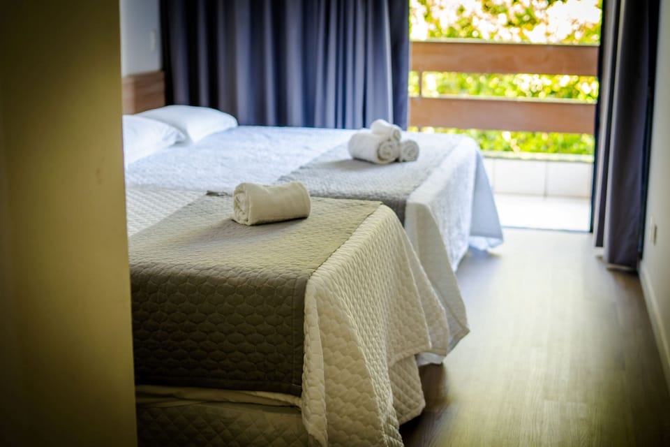 Laptop workspace, free WiFi, bed sheets