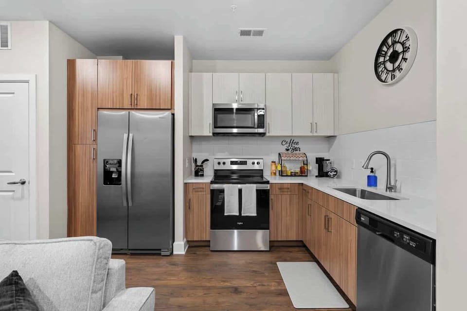 Sleek kitchen w/ stainless appliances ready for quick meals