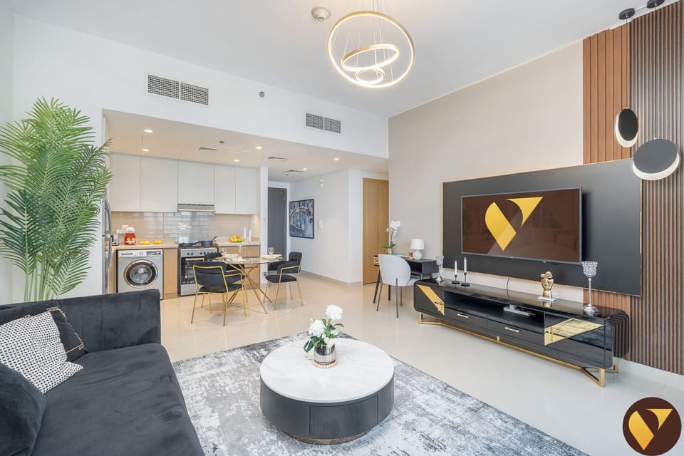 Luxury Apartment, City View | Living area | 55-inch Smart TV with cable channels