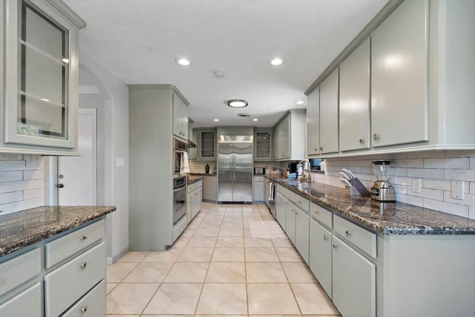 Savor the art of culinary bliss in our meticulously designed kitchen