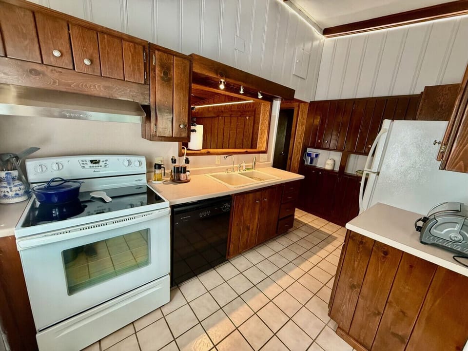 Full kitchen is located between our front living room and our dining area.