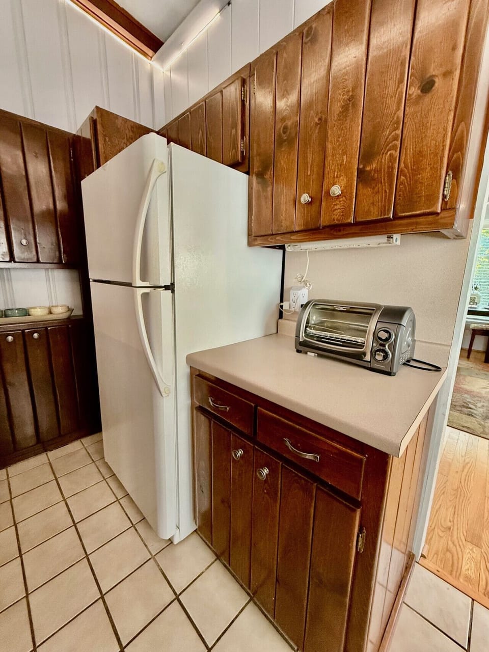 Full kitchen is located between our front living room and our dining area.