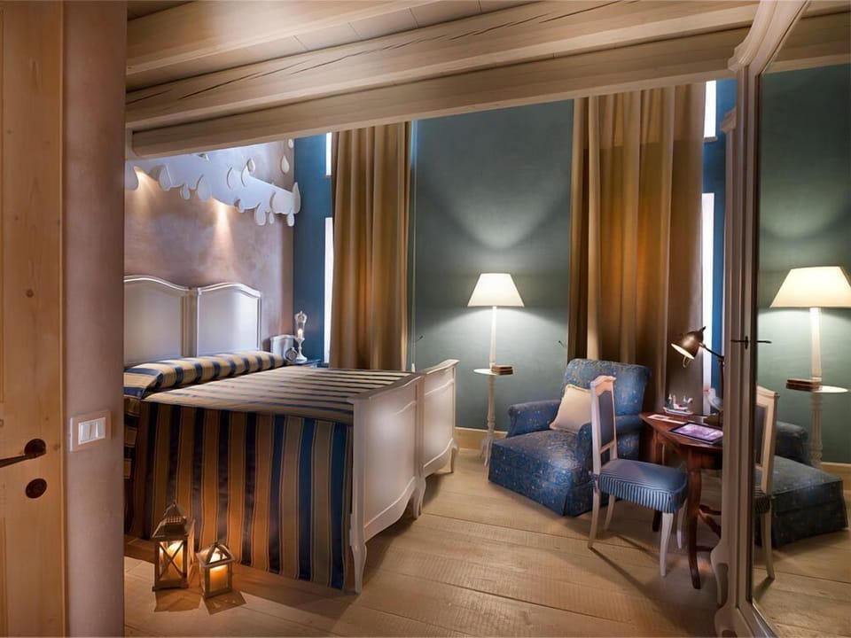 Quadruple Room | Down comforters, minibar, in-room safe, desk