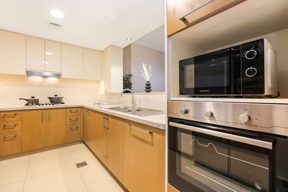 Gourmet Kitchen: Cook up a storm in sleek style with modern appliances and elegant finishes!