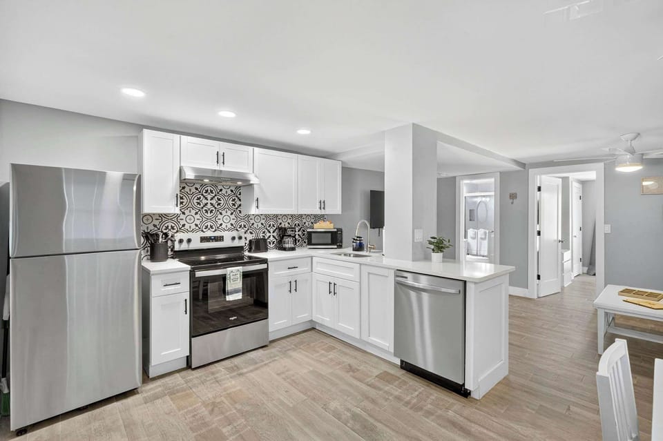 Newly remodeled kitchen and well stocked kitchen offer all of conveniences. 