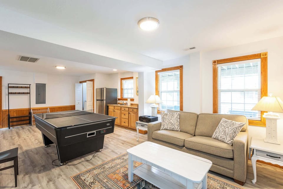 Ground Level: Game Room with Lounge & Pool View