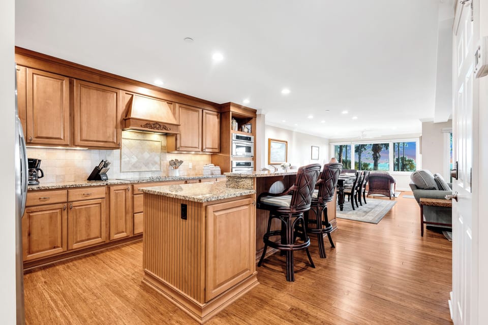 The fully equipped kitchen sets the stage for culinary adventures with top-of-the-line appliances and everything you need to prepare memorable family meals