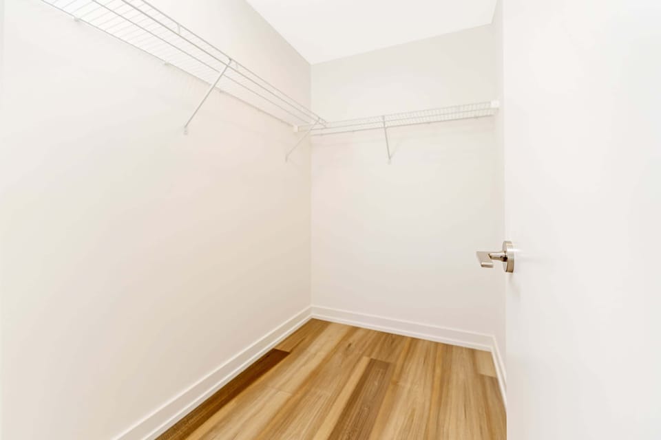 Spacious Walk-In Closet Offering Ample Storage For Your Stay