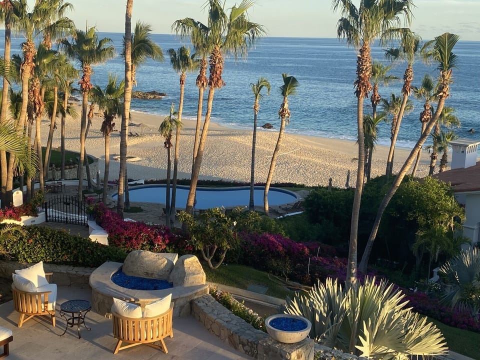 Poolside patio with beachfront views