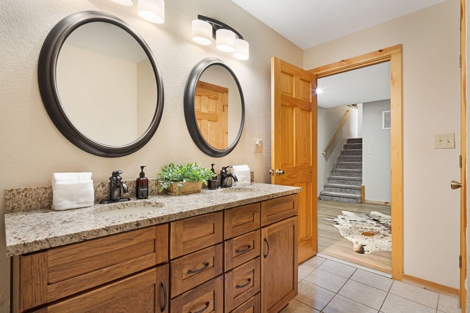Lower Level - Shared Shower Bath w/ Dual Vanities