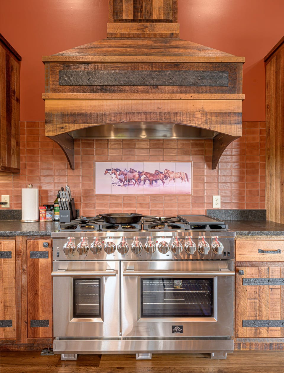 Professional grade gas range, electric ovens and high volume exhaust hood