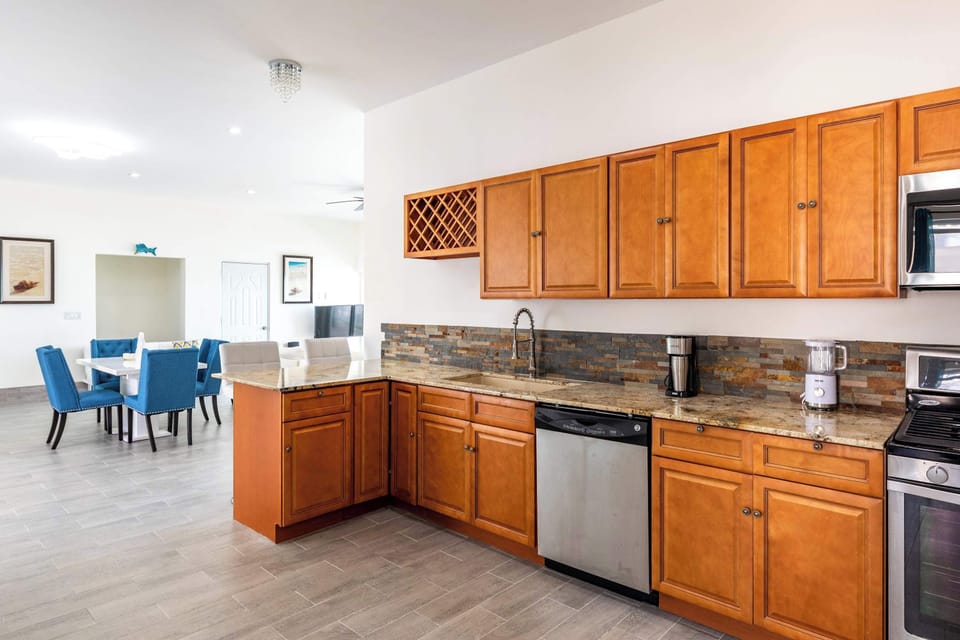 Whip up quick meals and share stories around this vibrant dining area.
