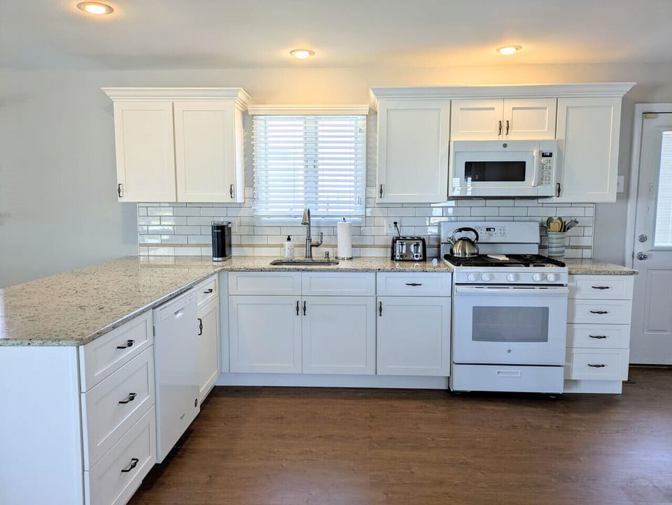 The kitchen has a gas stove for all your favorite homecooked meals.