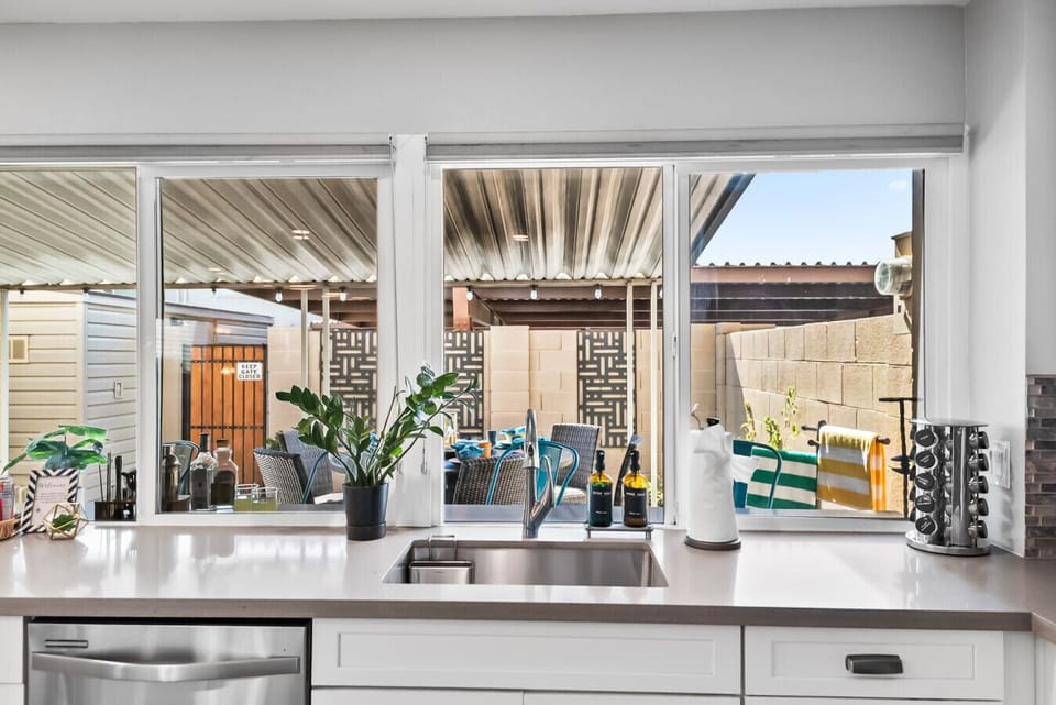 Spacious Kitchen: Enjoy seamless cooking with a sunlit view and easy access to the vibrant backyard.