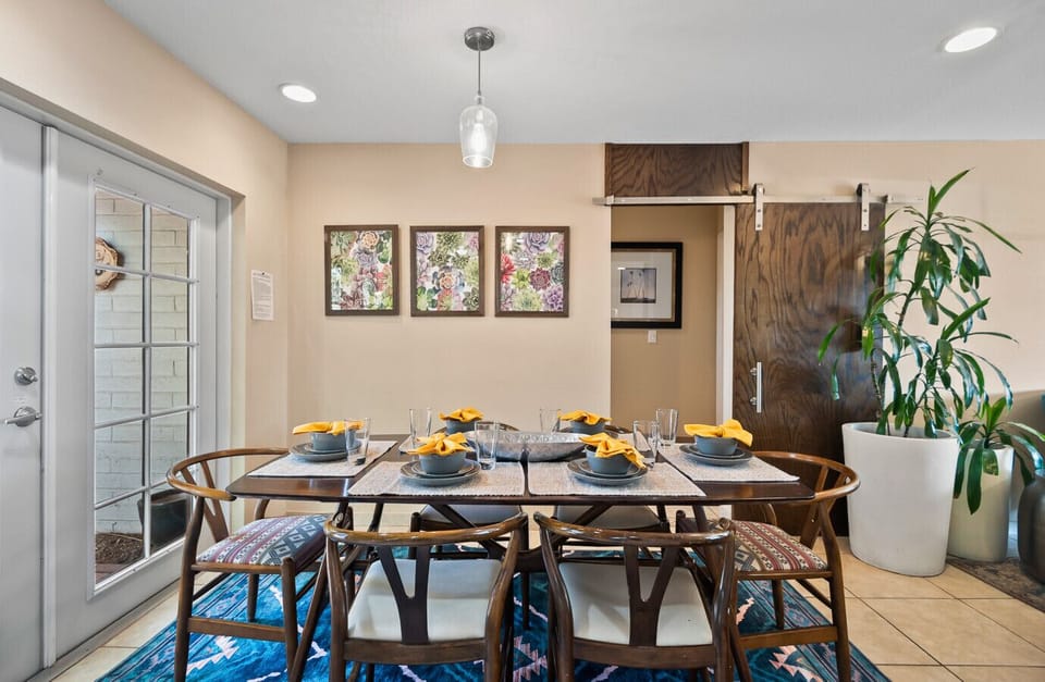 Gather around the 6-seat dining table—ideal for enjoying home-cooked meals, planning adventures, or celebrating special moments together.