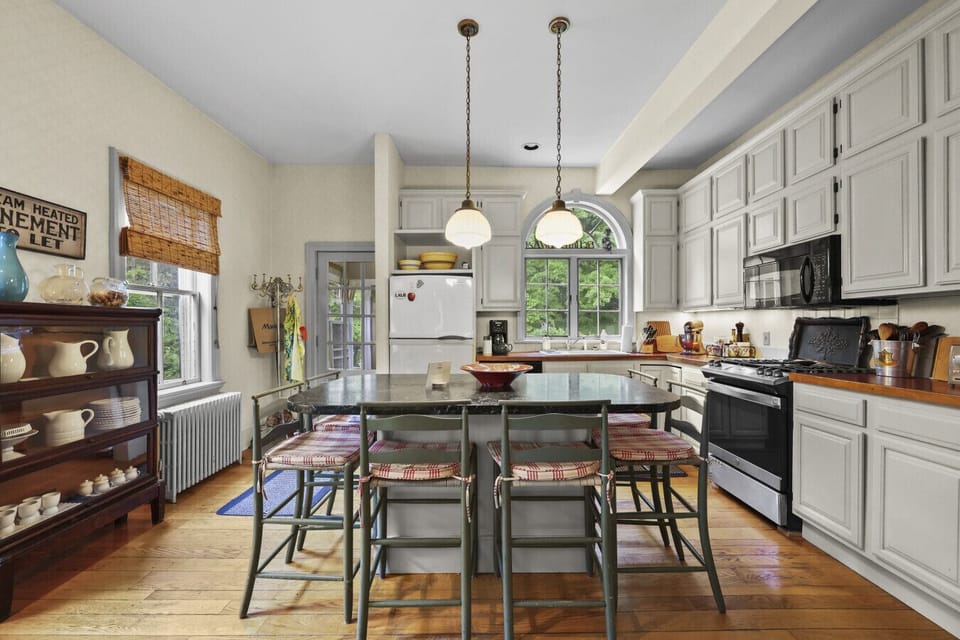 Open kitchen with island seating for six.