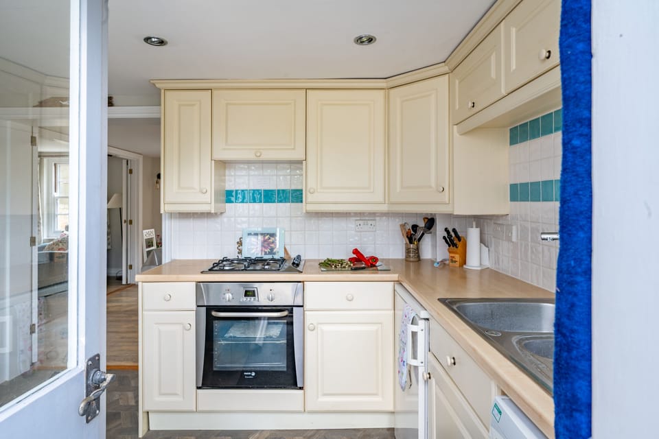 Ground floor: Kitchen with a dishwasher, fridge and freezer