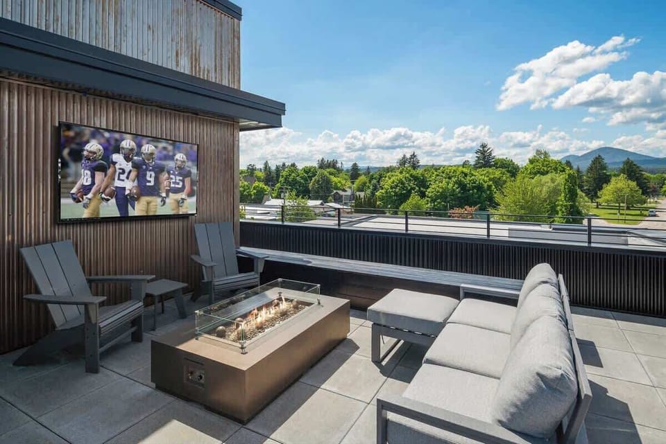 Outdoor TV, fire table and lounge area. 