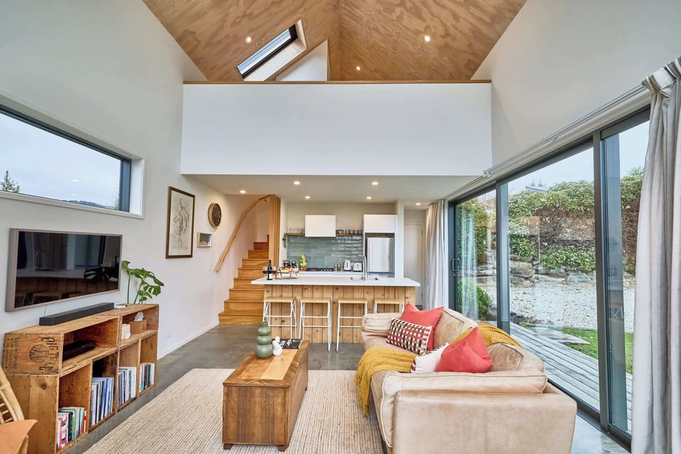 Living Room: Bright, airy space with sleek decor, perfect for relaxation and enjoying nature views!