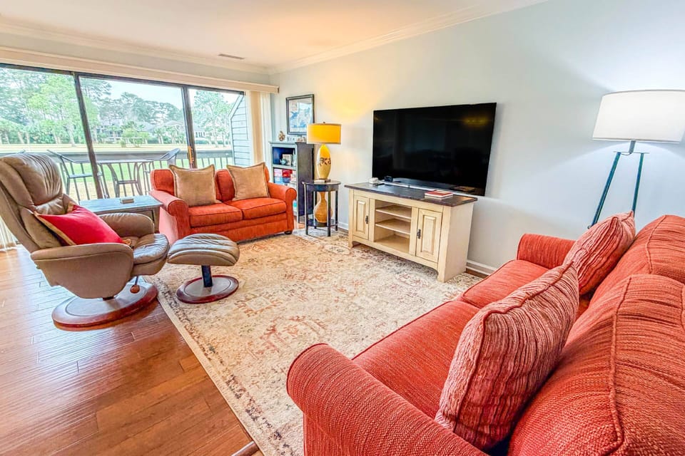 Golf, Sea & Sunshine is an Inverness Village end unit villa with golf course views & lovely sunlight.