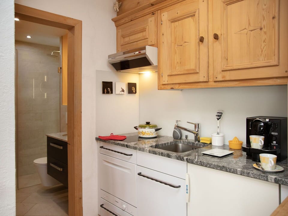 Kitchen, Countertop, Kitchen Appliance, Furniture, Cabinetry, Interior Design, Major Appliance, Wood, Flooring, Sink