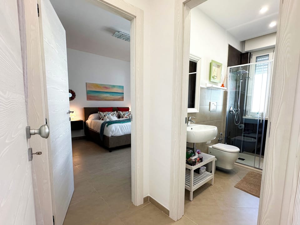 Triple Room, Non Smoking, Garden View | Bathroom | Shower, rainfall showerhead, hair dryer, towels