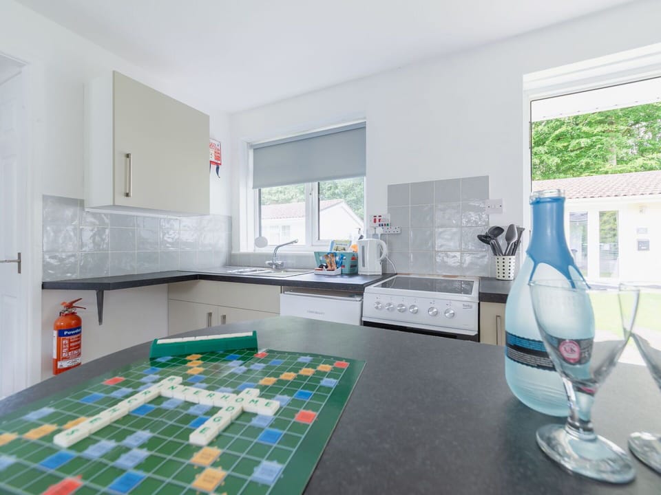 Interior Design, Flooring, Kitchen, Apartment, Floor, Home, Ceiling, Room, Countertop, Major Appliance
