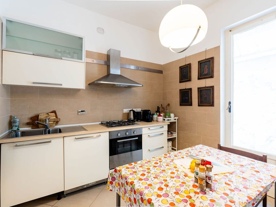 Kitchen, Kitchen Appliance, Furniture, Countertop, Interior Design, Major Appliance, Flooring, Wood, Cabinetry, Floor