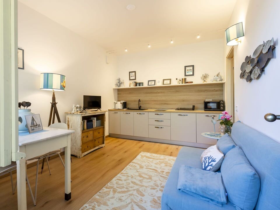 Furniture, Interior Design, Flooring, Wall, Room, Wood, Floor, Ceiling, Lighting, Cabinetry