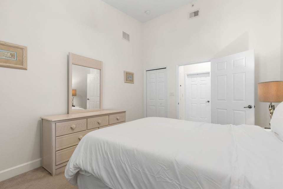 Queen guest bedroom features a calming ocean touches.