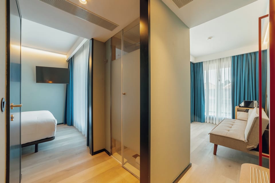 Superior Single Room, City View | In-room safe, desk, laptop workspace, blackout drapes