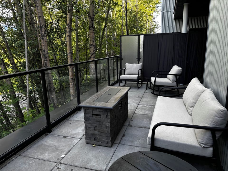Very large private balcony with forest/mountain views. 