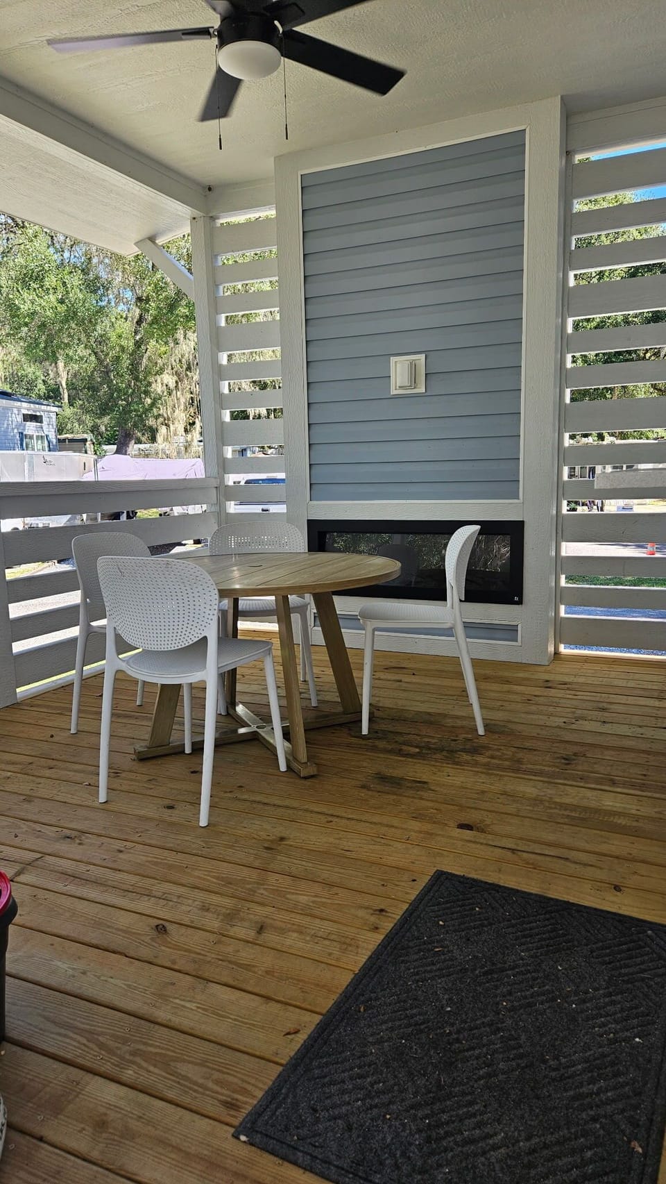 Outdoor private porch with fireplace for ambiance