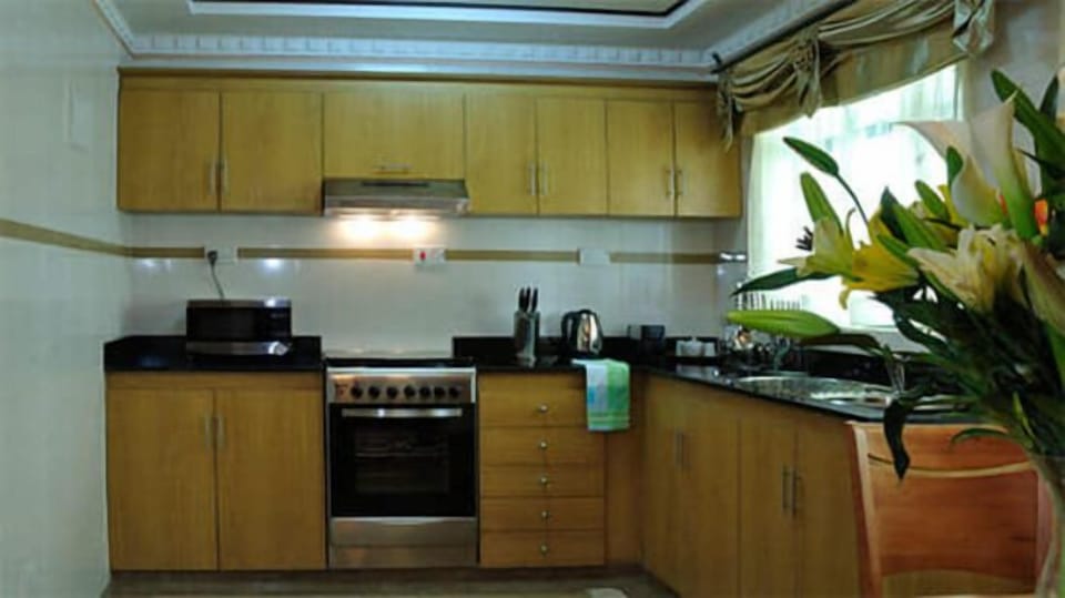 Family Apartment, Pool View | Private kitchen