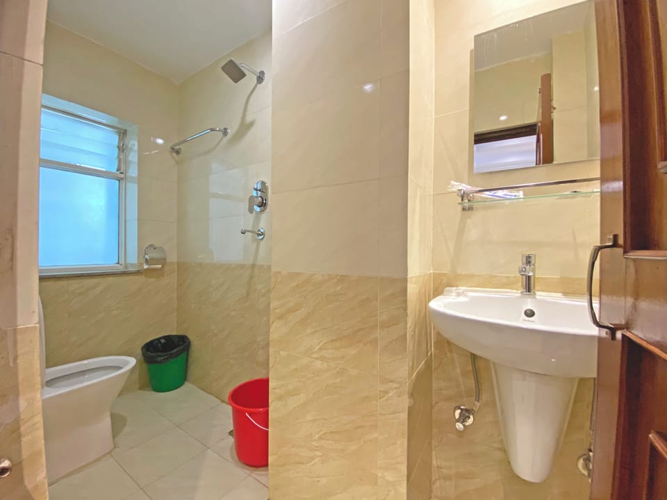 Shower, slippers, bidet, towels