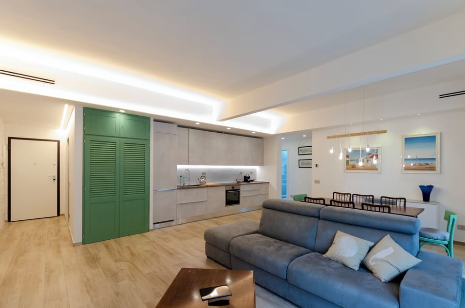 Comfort Apartment, City View | Living area | Flat-screen TV