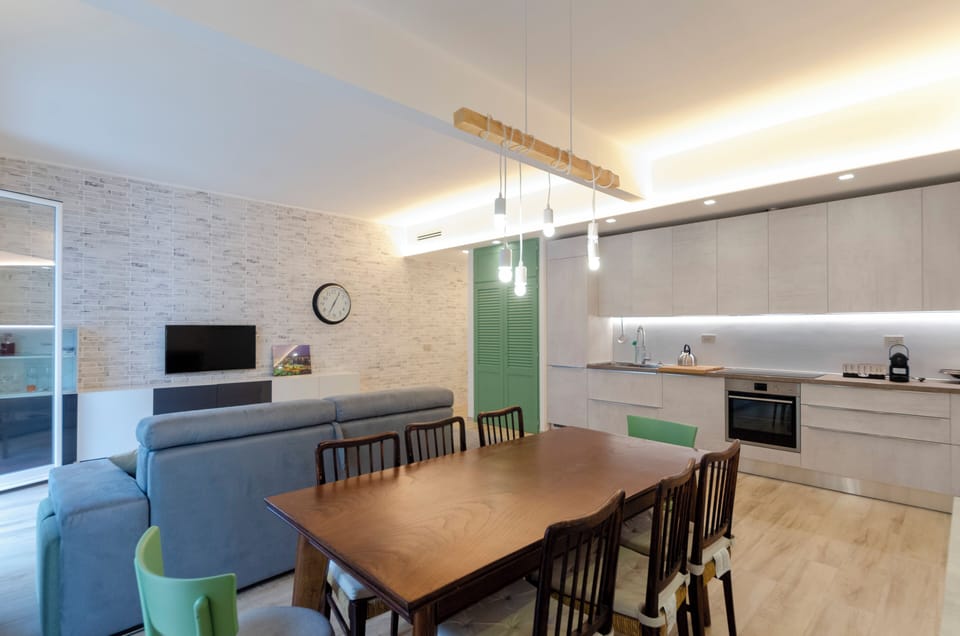 Apartment, 2 Bedrooms, Balcony, Partial Sea View | Private kitchen | Espresso maker, dining tables